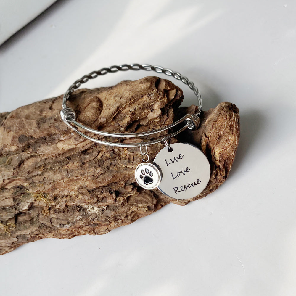 Stainless Steel “Live Love Rescue” Paw Bangle – Adjustable